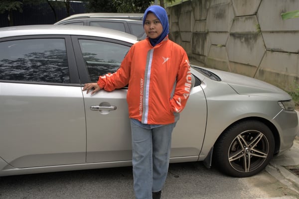 Farihah with her car