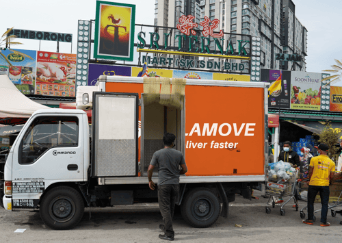 Lalamove refrigerated truck waiting to pick up raw seafood from Sri Ternak
