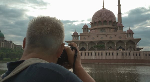 Uncle Lam capturing images of Putra Mosque during sunrise