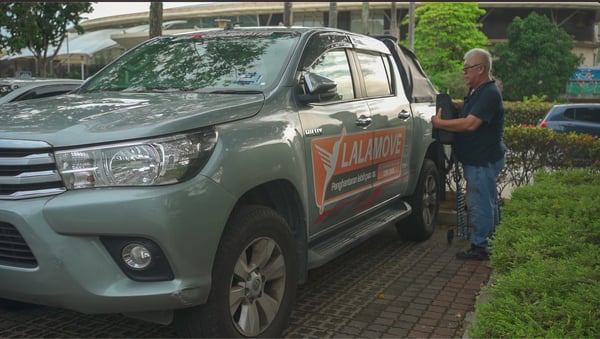 Uncle Lam loading his gear into his 4 x 4 pickup