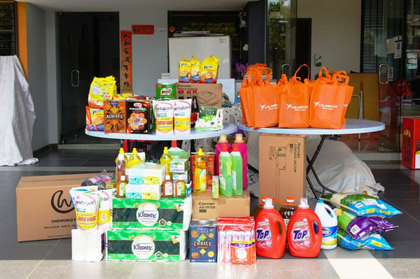 an image showing the donations of essential items received by rumah charis old folks home donated by lalamove business clients including caring pharmacy, white on white, paradigm global marketing and one world ppe