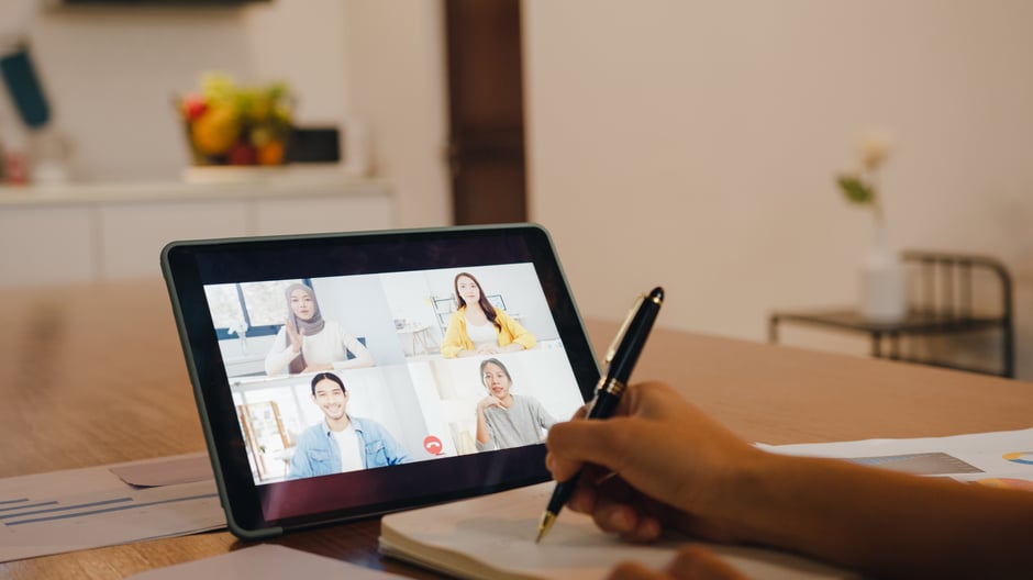 asia-businesswoman-using-digital-tablet-talk-colleague-about-plan-by-video-call-brainstorm-online-meeting-while-remotely-work-from-home-kitchen-1
