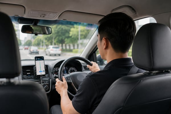 driver looking at GPS
