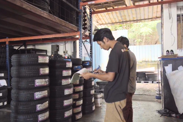 ht group staff checking tyre supply