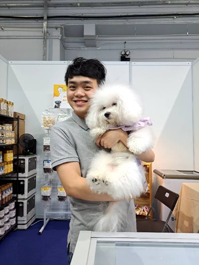jayden, the founder of boksicle, with his dog bok who opened a vendor at the recent oh my pet expo in johor bahru