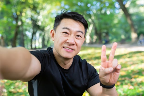 selfie man with peace sign