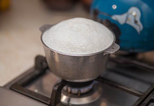 Boiling milk until it spills for good luck