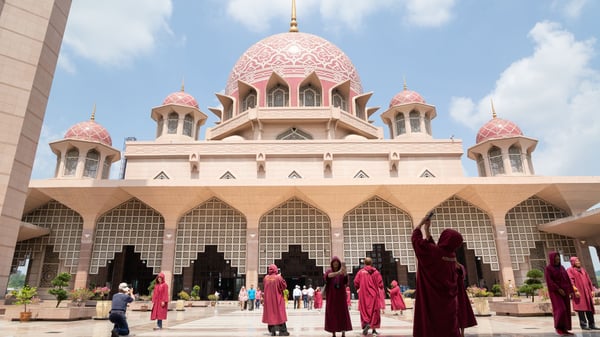 tourist at pink mosque